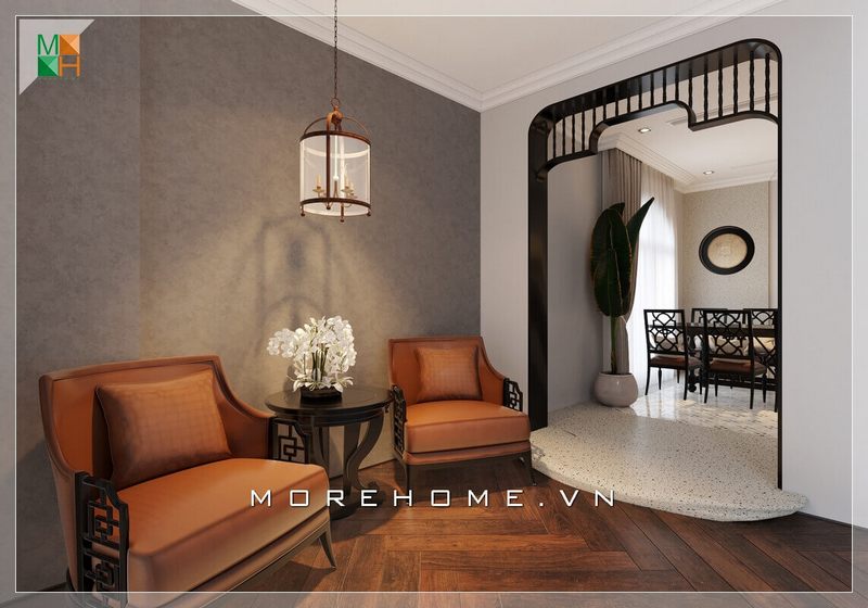 và ấm cúng. Ghế sofa bằng gỗ tự nhiên óc chó cao cấp, được trang bị đệm bọc da nhập khẩu màu nâu cam, sẽ góp phần tạo nên không gian sang trọng và ấm cúng với phong cách tân cổ điển.